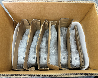 Covered by bubble bag, insulated by the paper board, hard carton packaging